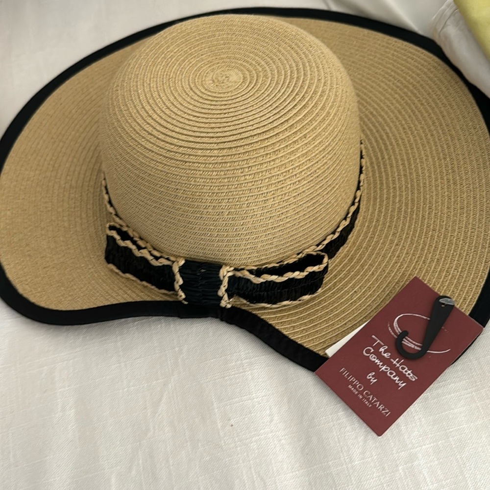 The Hats Company by Filippo Catarzi.  So cute but I never wore it.  Black bow